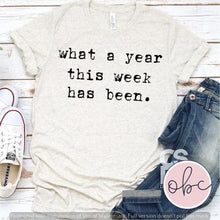 Load image into Gallery viewer, What A Year This Week Has Been Graphic Tee